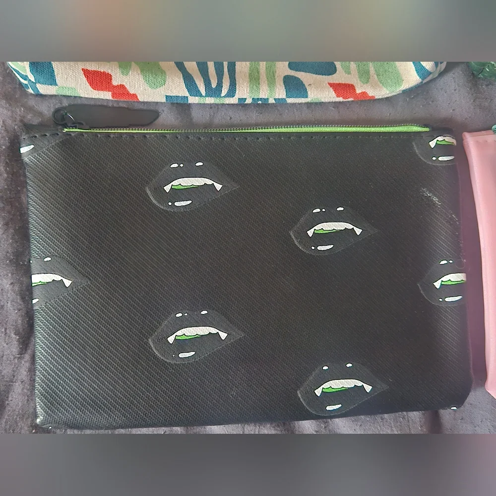 4 ipsy makeup/travel bags